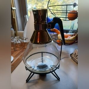 Elegant Gold and Black Coffee Maker